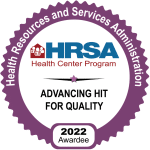 The HRSA Advancing HIT for Quality logo. It says, "Health Resources and Services Administration. HRSA Health Center Program. Advancing HIT for Quality. 2022 Awardee."